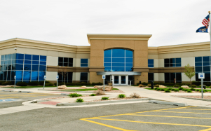Single-story commercial building with blue tinted windows
